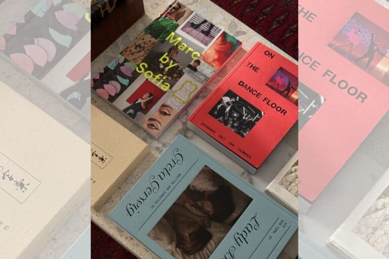 Display of books on a coffee table arranged aesthetically.